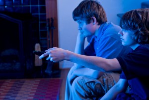 Boys with TV remote