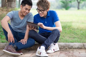teen boys using tablet