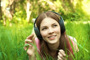 teen girl listening to headphones