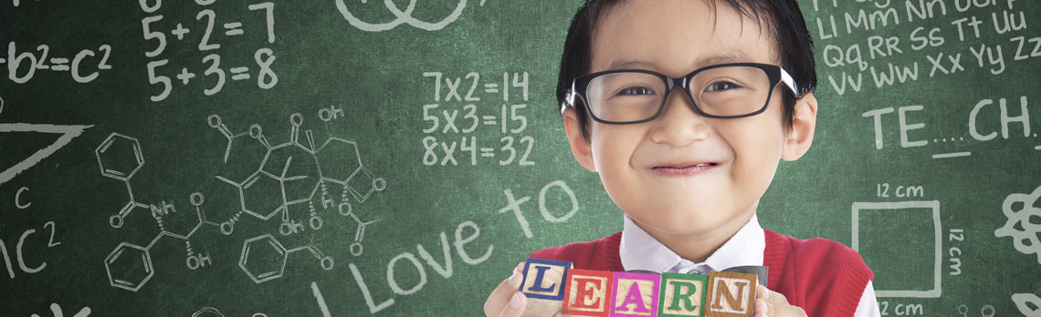 boy-with-chalkboard-and-blocks