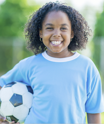girl with soccer ball