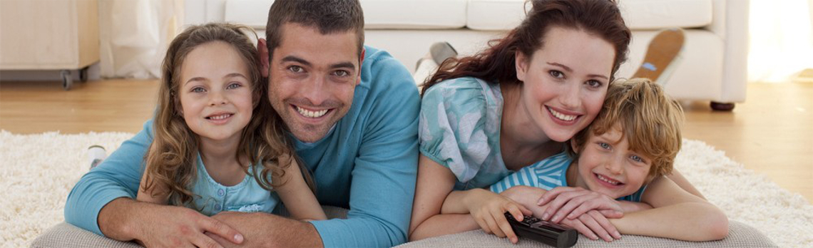 Happy-family-with-TV-remote