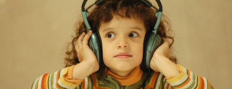 child with large headphones on