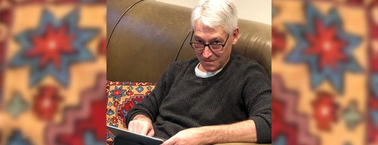 Joe Wolfson using a tablet